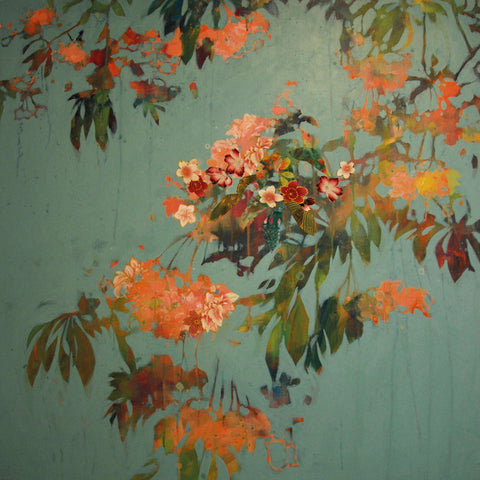Branches of blossom with orange flowers and green leaves, collage effect.