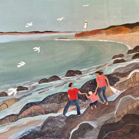 Art greeting card by Barbara Peirson. Two women with a child on the rocks by the sea.
