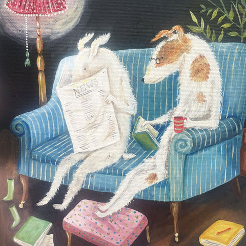 Art greeting card by EC Woodard. Two dogs sitting together on a sofa, one reading the paper, the other reading a book and drinking tea.