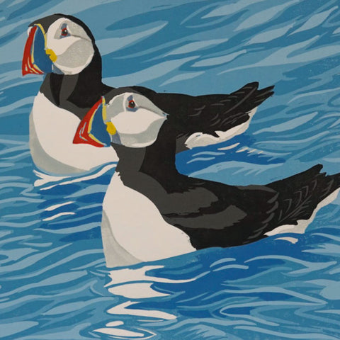 Puffins on the Sea