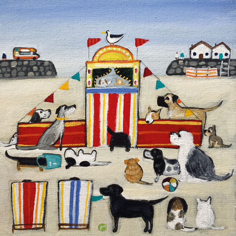 Art Greeting Card by Louise Rawlings, Dogs on the beach watching a puppet show