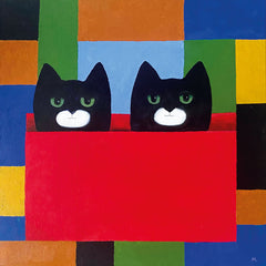 Art greeting card by Martin Leman. Two black cats with green eyes and white mouths, poking their heads out of a red box. Colourful patchwork background.