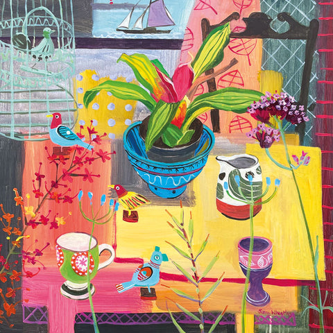 Art greeting card by Jenny Wheatley NEAC. A colourful table with a plant and jugs. Flowers and bird ornamants with a window in the background and a boat.