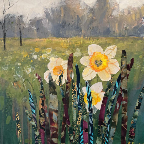 Woodland in background, big yellow daffodils in foreground with collage effect.