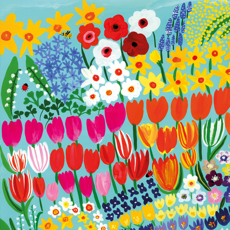 Colourful flowers with lots of tulips and blue background.