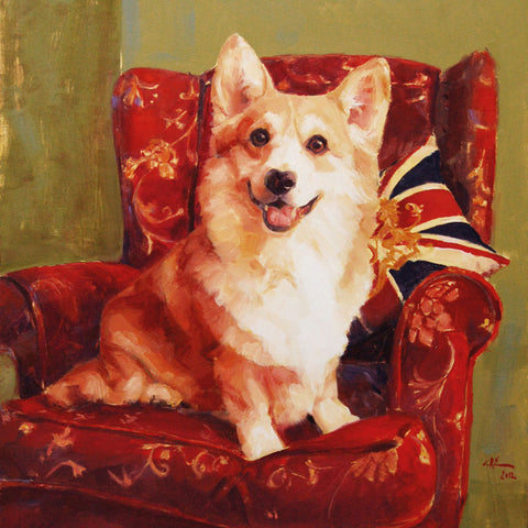 A portrait of a Champion Welsh Corgi sitting on an armchair with a Union Jack cushion behind.