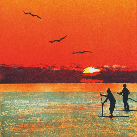 Art greeting card, linocut of paddle boarders and a sunset with birds.