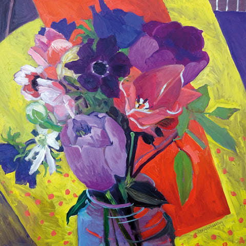 Colourful vase of mixed flowers, colourful background.