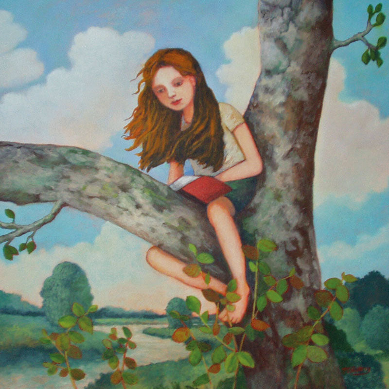 Girl sitting on branch of a tree reading a book.