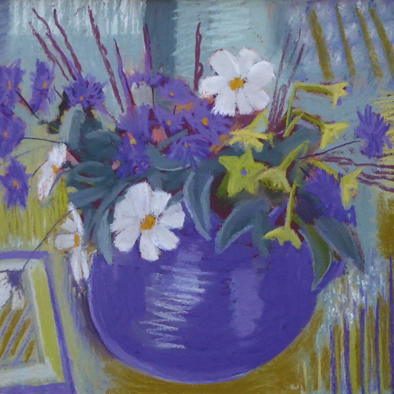 Round purple vase with purple and white flowers and an abstract background.